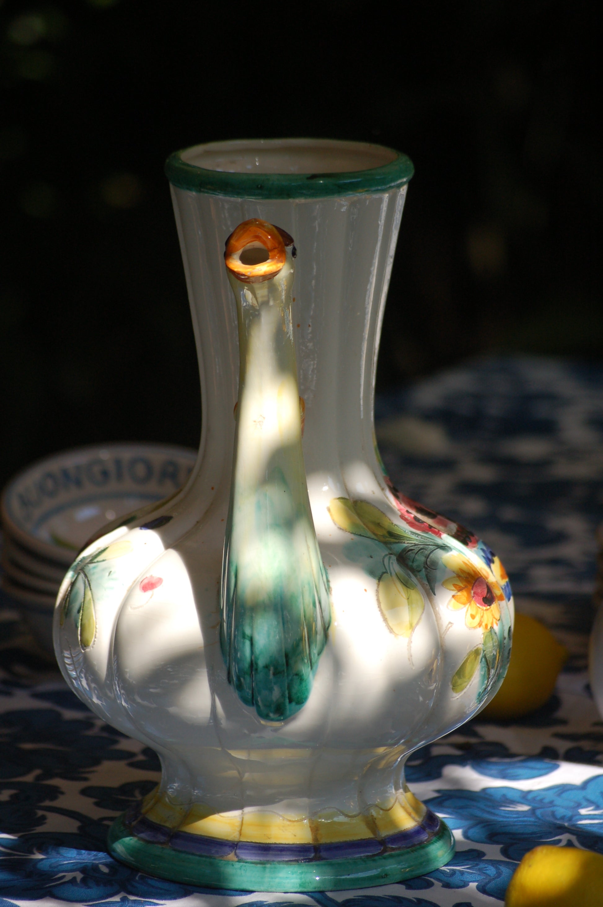 Italian vintage carafe decorated with flowers and goose head from the sixties front