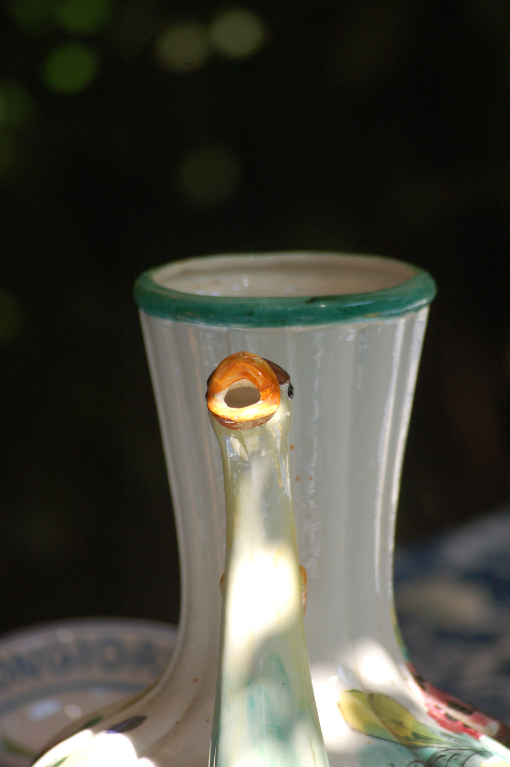 Italian vintage carafe decorated with flowers and goose head from the sixties front detail