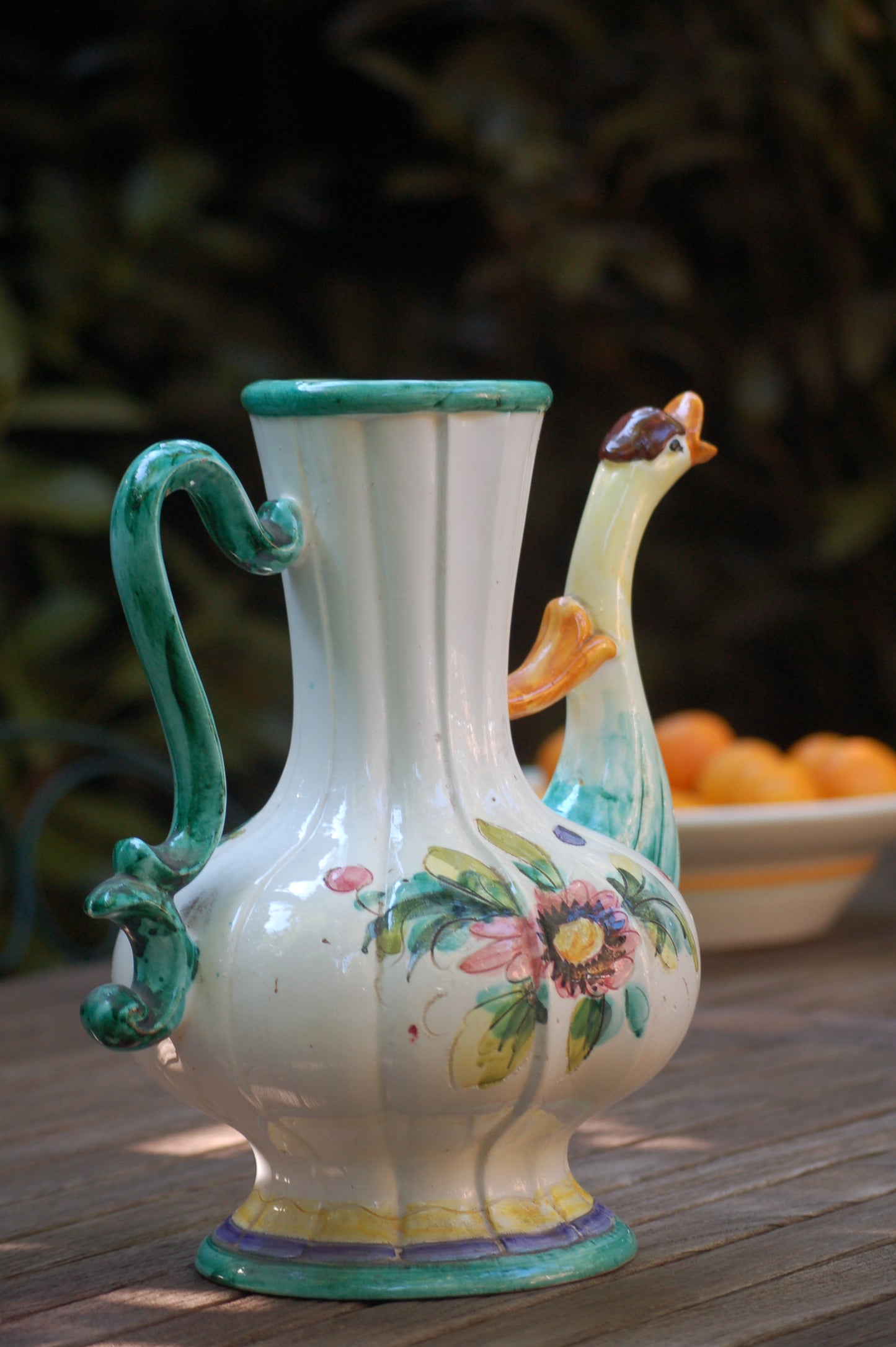 Italian vintage carafe decorated with flowers and goose head from the sixties handle
