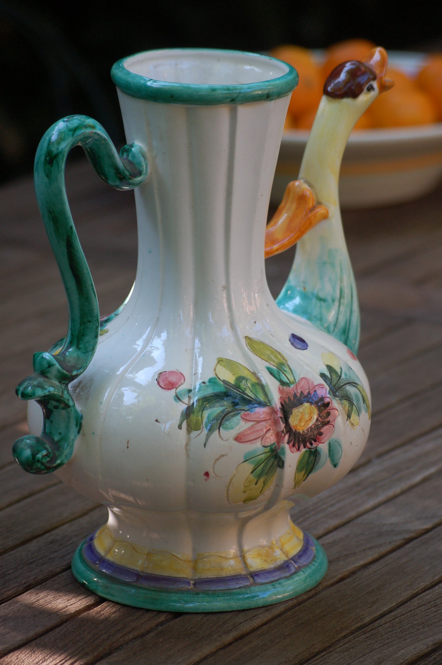Italian vintage carafe decorated with flowers and goose head from the sixties