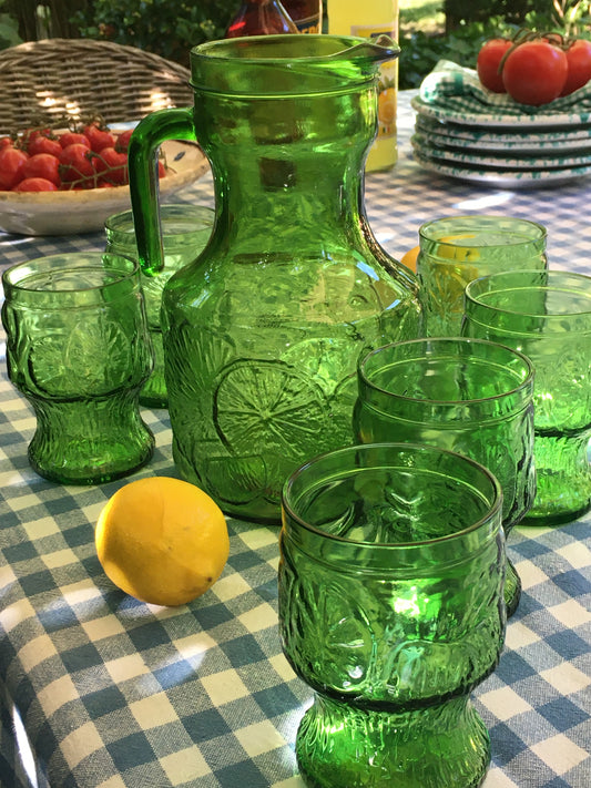 Italy vintage green glass set  by Bormioli with embossed Lemon slices, 6 tumblers and a carafe by Italian Summers