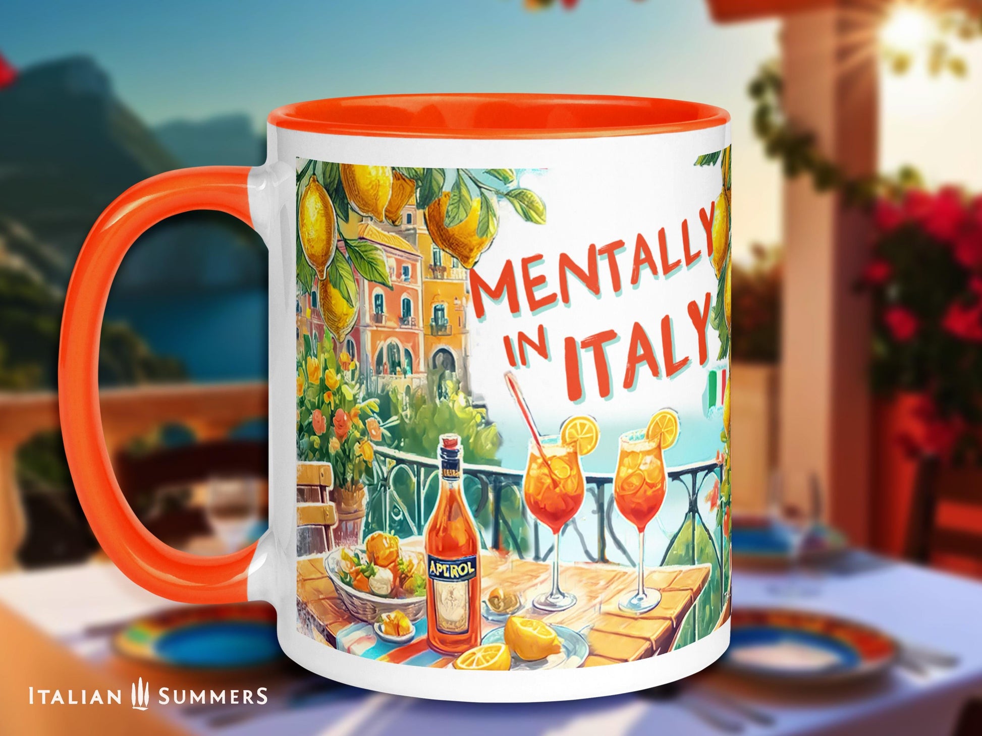 A ceramic mug featuring an illustrated Amalfi Coast view with Aperol Spritz glasses and a bottle of Aperol on a table. The text reads "Mentally in Italy, Sipping a Spritz", with an option to customize the phrase. A perfect gift for Italy lovers and travel enthusiasts.