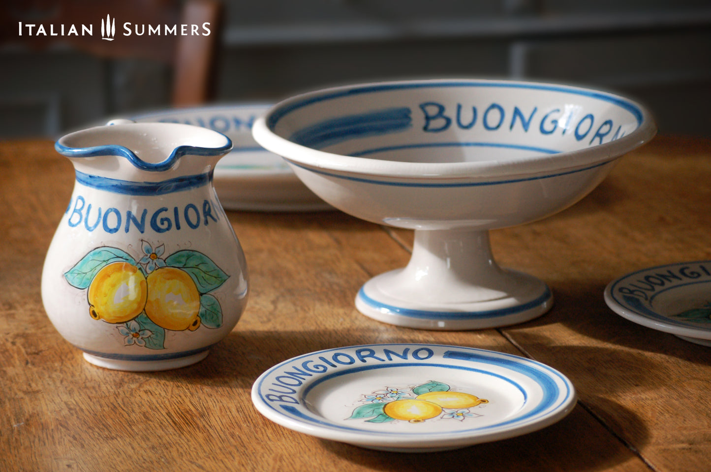 Italy ceramic fruit stand with Amalfi Coast lemons and the greeting Buongiorno . Hand painted in Sicily. Designed and sold by Italian Summers