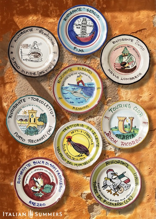 A collection of Buon Ricordo plates vintage Italian restaurant plates from Vietri sul Mare on the Amalfi Coast.