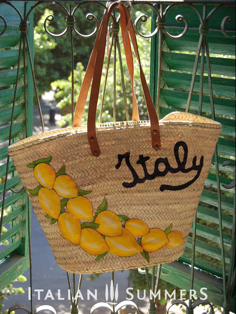 This large straw bag ITALY LEMONS  with hand-painted Amalfi lemon appliques and an embroidered "Italy" quote. Designed and sold by Italian summers This straw bag is made to order.