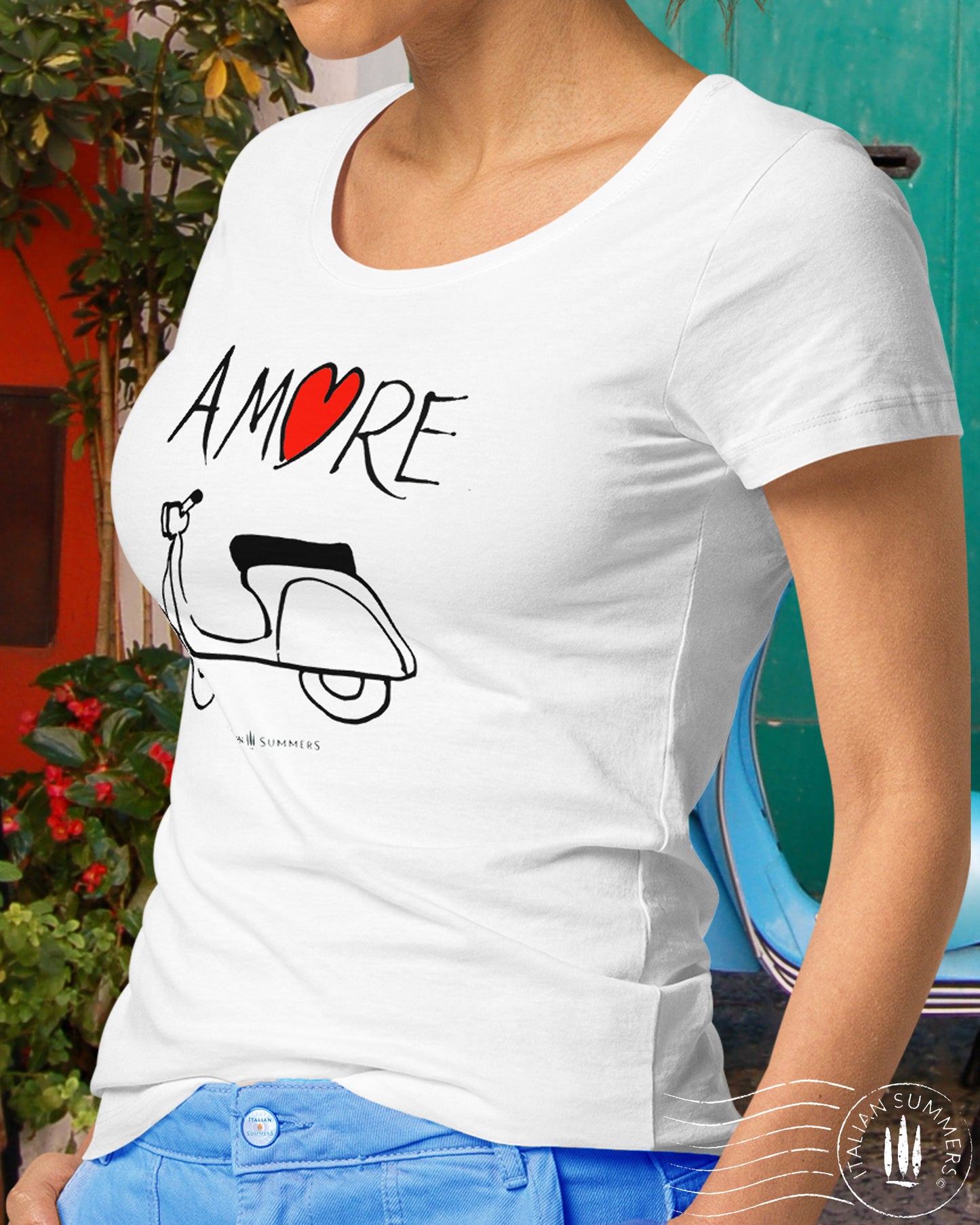 Italy inspired  white T Shirt  with a print of  hand-painted artwork we produced for a ceramic plate.  The  the word 'Amore'  with a vintage Vespa scooter  underneath. For all nostalgic Italy lovers, sure to bring a smile and a conversation in like-minded people! Made by Italian Summers