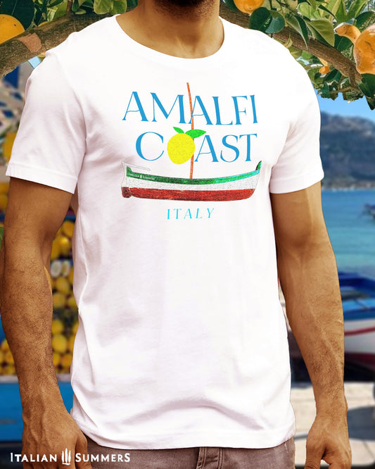 An athletic tanned Italian man wearing a white T shirt with blue text: AMALFI COAST, the O in Coast is a yellow stylized lemon with two leaves.
Under the text is a traditional Amalfi coast boat called a Gozzo, in the traditional colors of the Italian flag, green, white, red.
The light-blue text ITALY ends the composition on the bottom.
