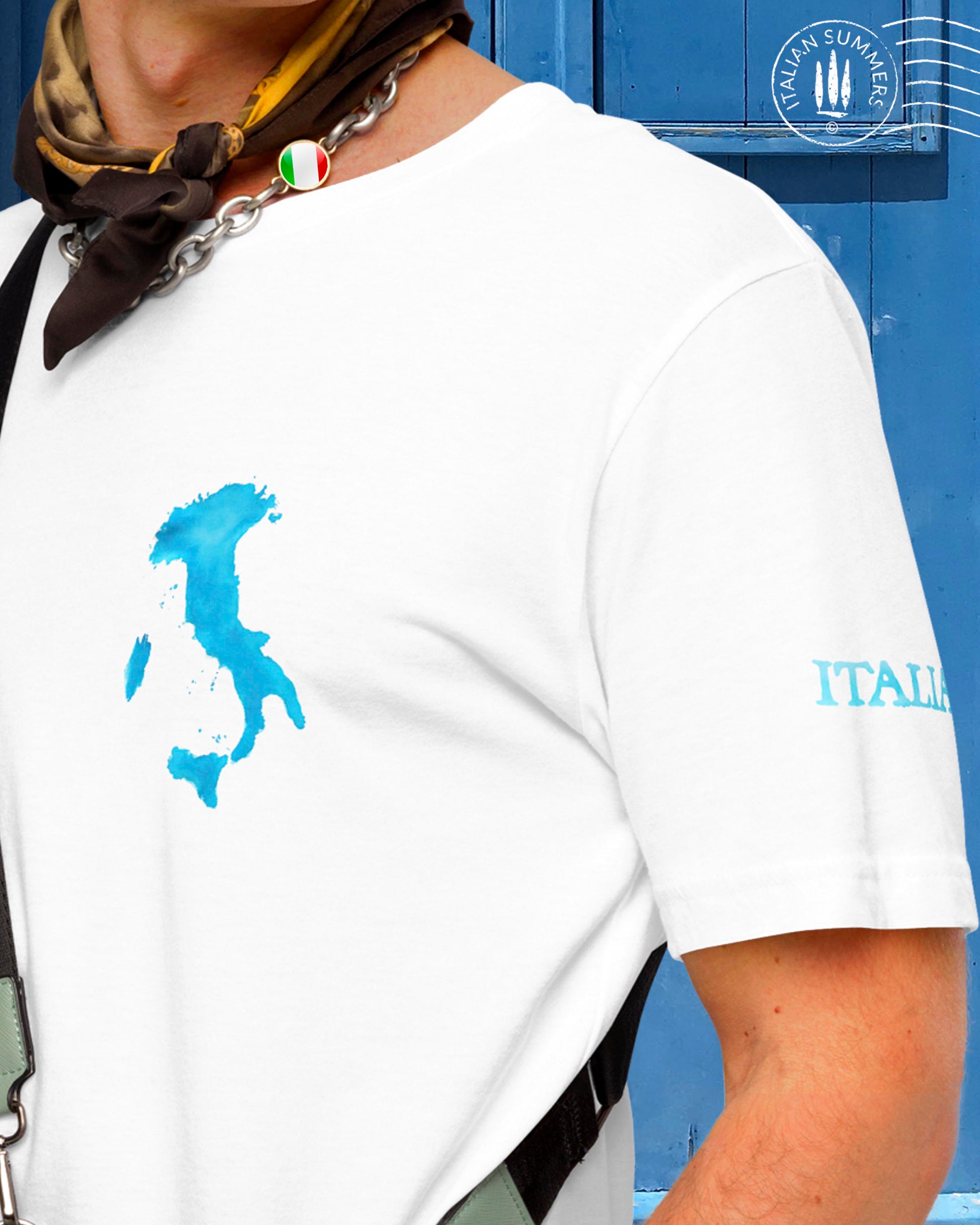 Italy Inspired T shirt with the print of a watercolor blue Italy shape over a hand-written letter from an  Italian Poet of the 1800s to an Italian Lady, the blue text ITALY is o the left sleeve, the blue watercolor shape of the country of Italy is on the left chest. Made by Italian Summers