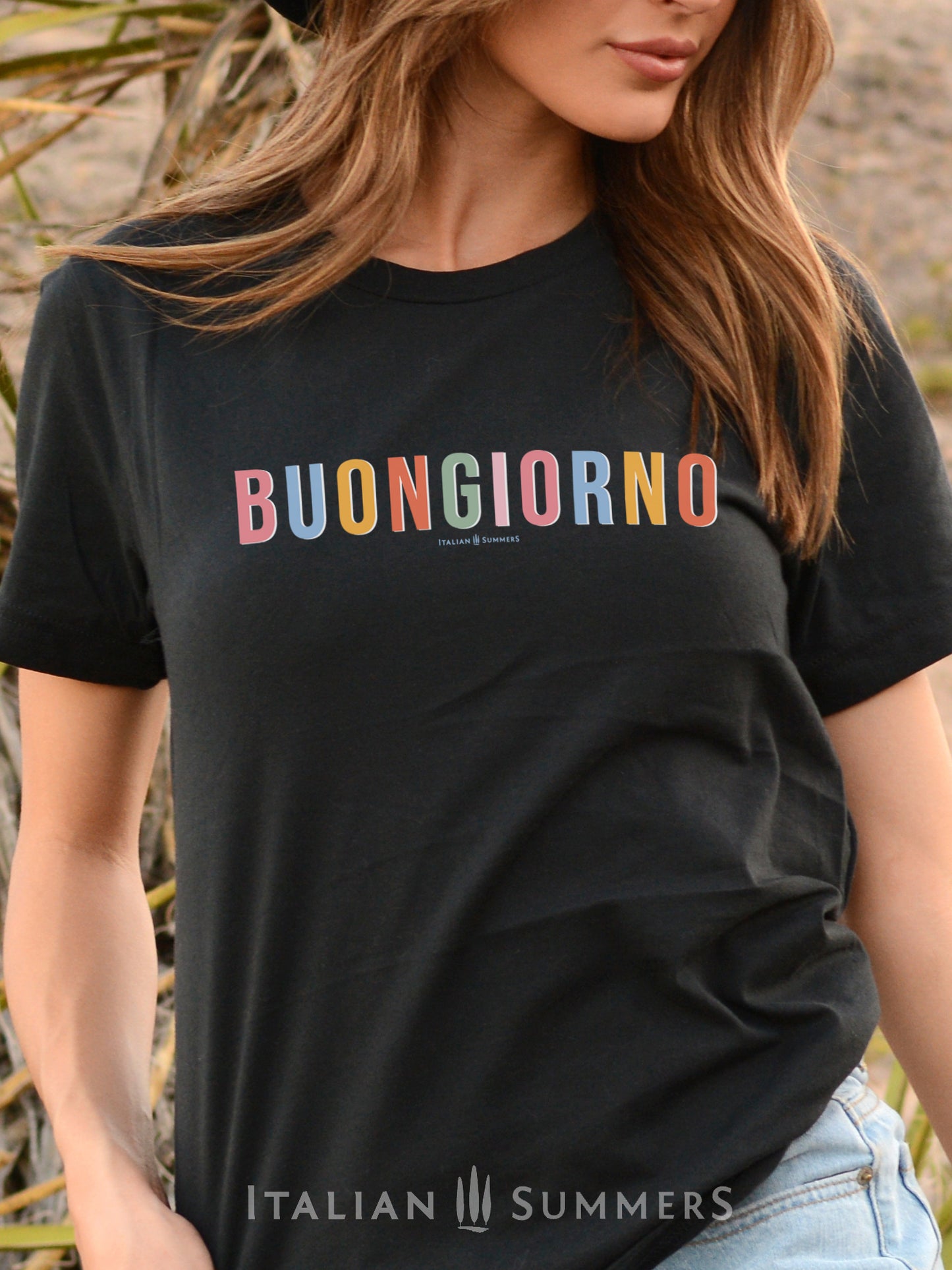 Itay inspired  white cotton T shirt with the Italian phrase " Buongiorno" printed in different soft pastel colors for each letter. A  subtle but stylish way to both wink at all Italy-lovers and to give a nice positive greeting to whomever reads it.