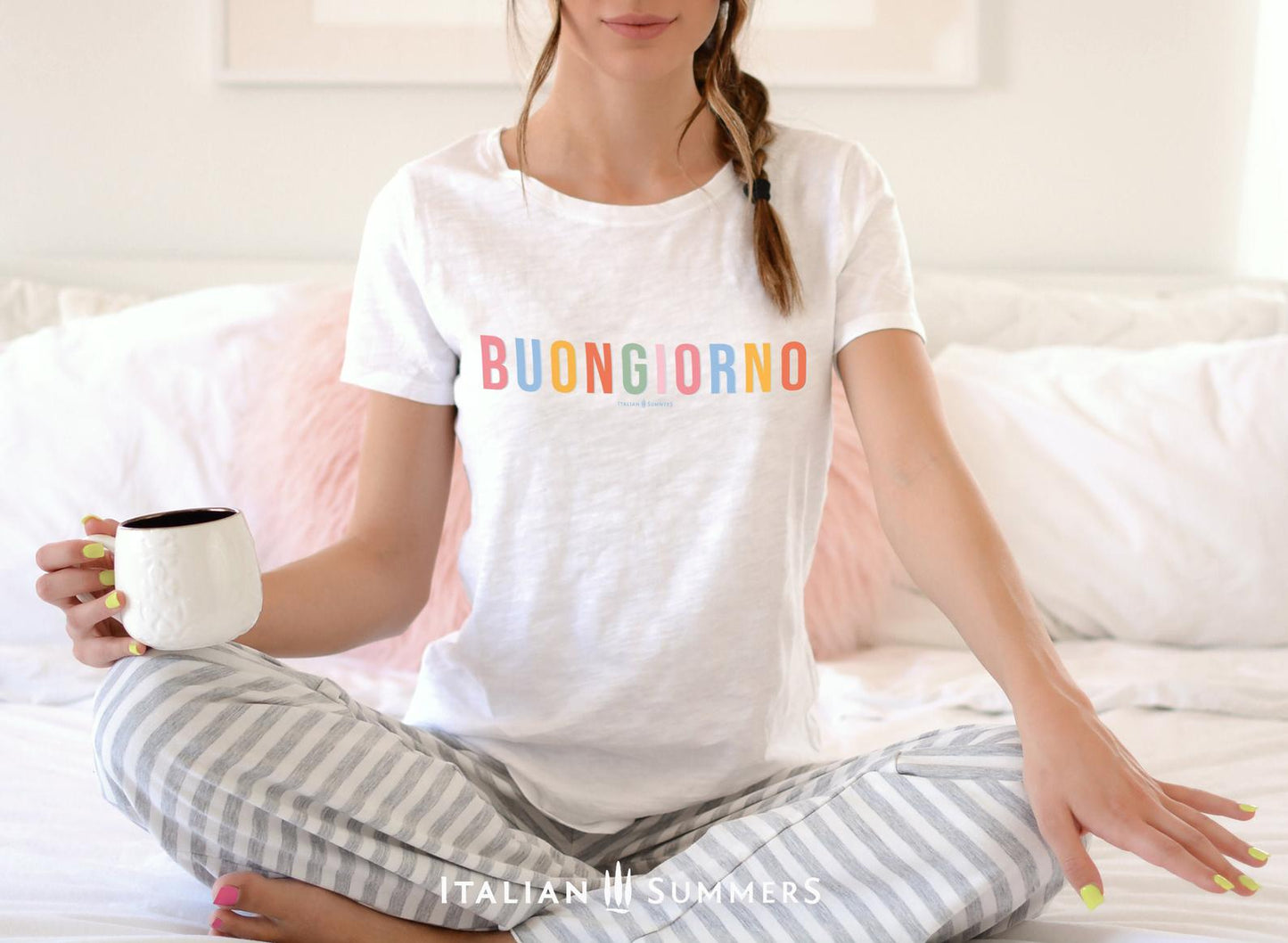 Itay inspired  white cotton T shirt with the Italian phrase " Buongiorno" printed in different soft pastel colors for each letter. A  subtle but stylish way to both wink at all Italy-lovers and to give a nice positive greeting to whomever reads it.