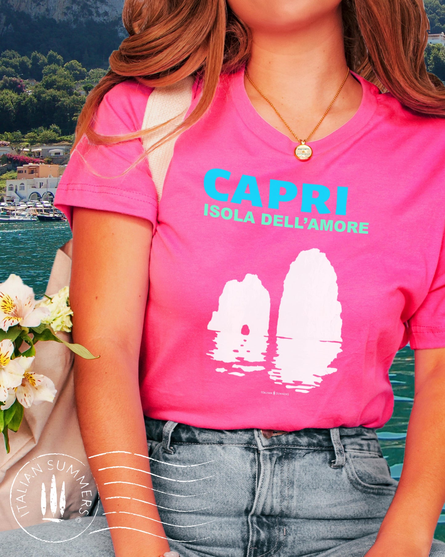 Italy inspired garment dyed T shirt with the aqua and white text: CAPRI, Isola dell'Amore (Capri, Iland of Love) with the silhouette  of the famous Faraglioni and their reflection umpon the waters of the Mediterranean Sea. Made by Italian Summers