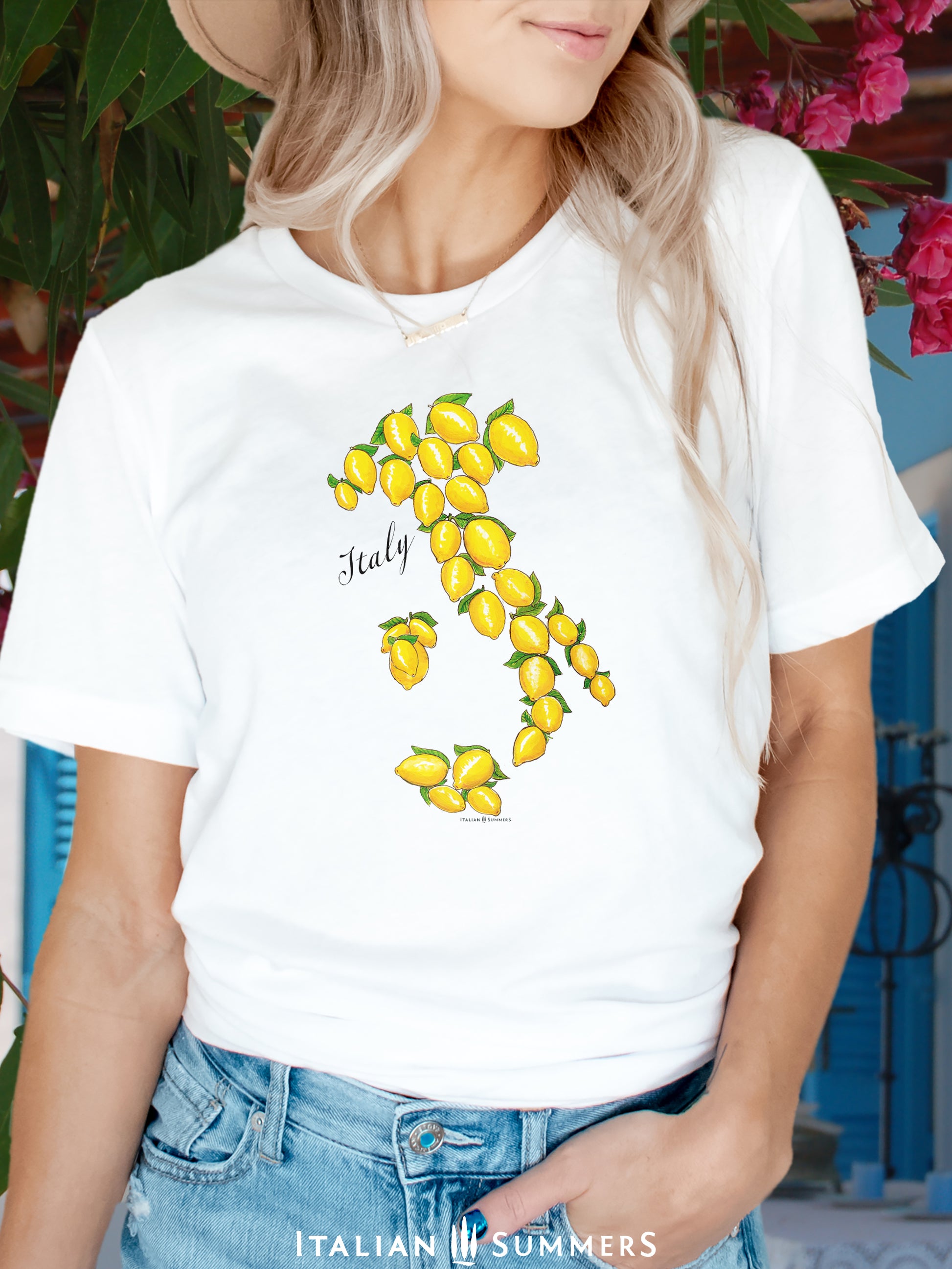 Unisex crew-neck Italy-inspire cotton T shirt with a print of the shape of the country of Italy composed of sunny Sorrento Lemons, an original design by Italian Summers