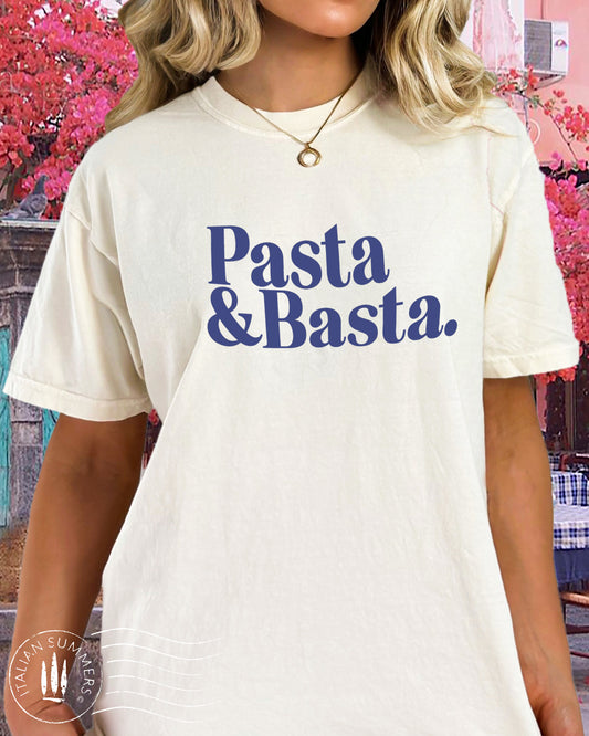 A girl is wearing an Italy-inspired light blue Unisex crew neck T shirt with a large retro text: Pasta & Basta.