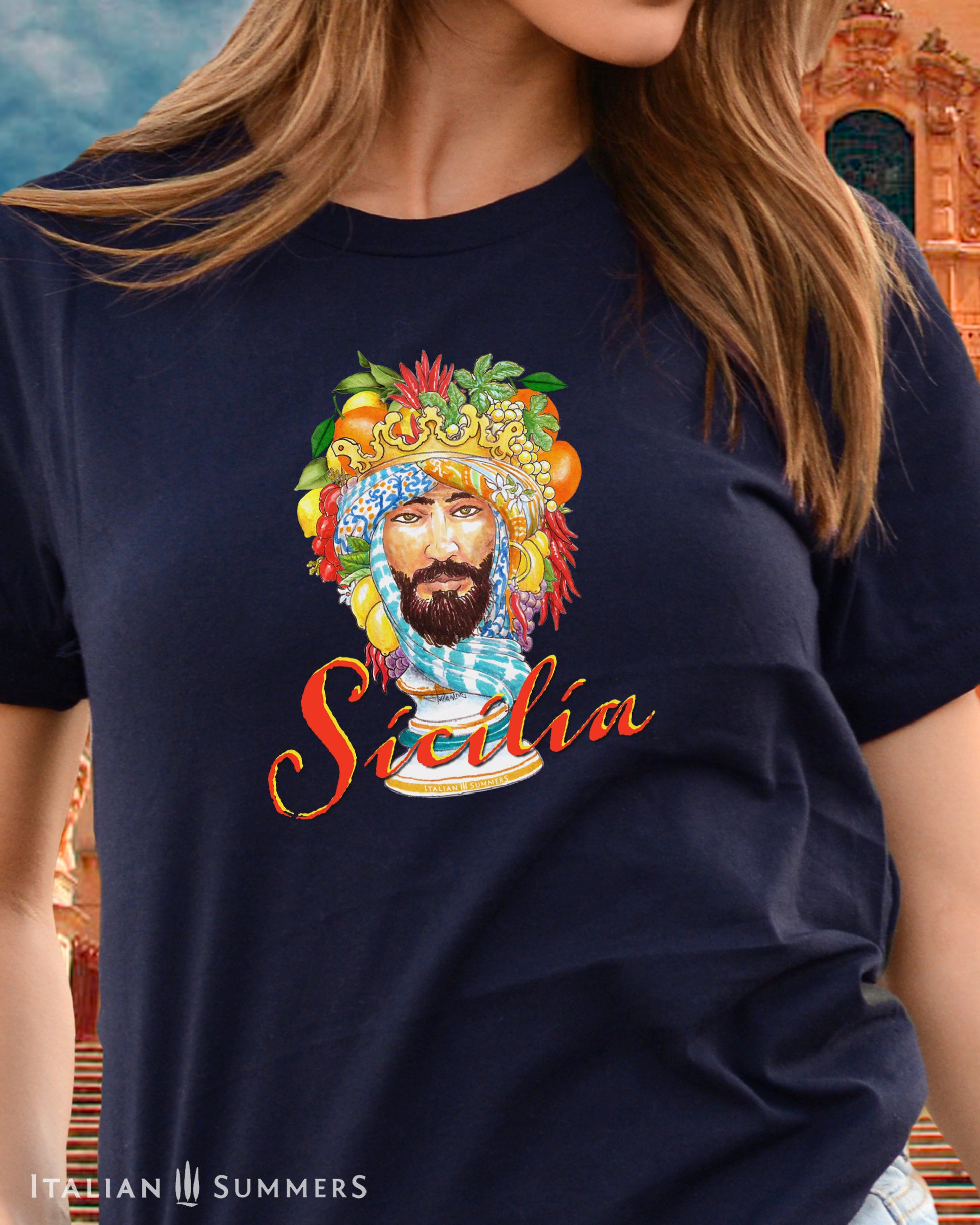 Italy inspired cotton unsex crew-neck T shirt with a hand-illustrated print of a decorative Moor's head from the Sicilian tradition of Caltagirone ceramic sculptures depicting the head of a Moorish nobleman with turban and decorative fruits.