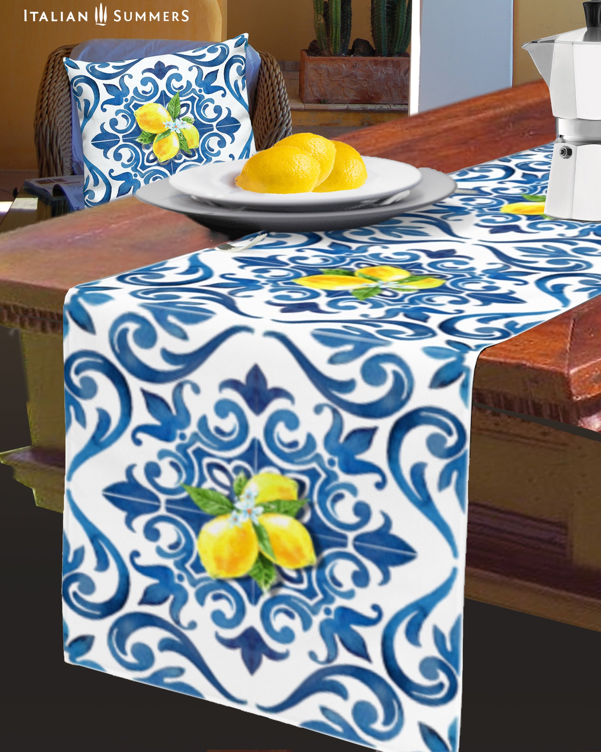 Italy inspired table runner printed with a blue and white pattern  of  Italian maiolica tiles and bundles of Sorrento lemons with flowers. A true Amalfi Coast decorational touch to any diningroom. Made by Italian Summers.