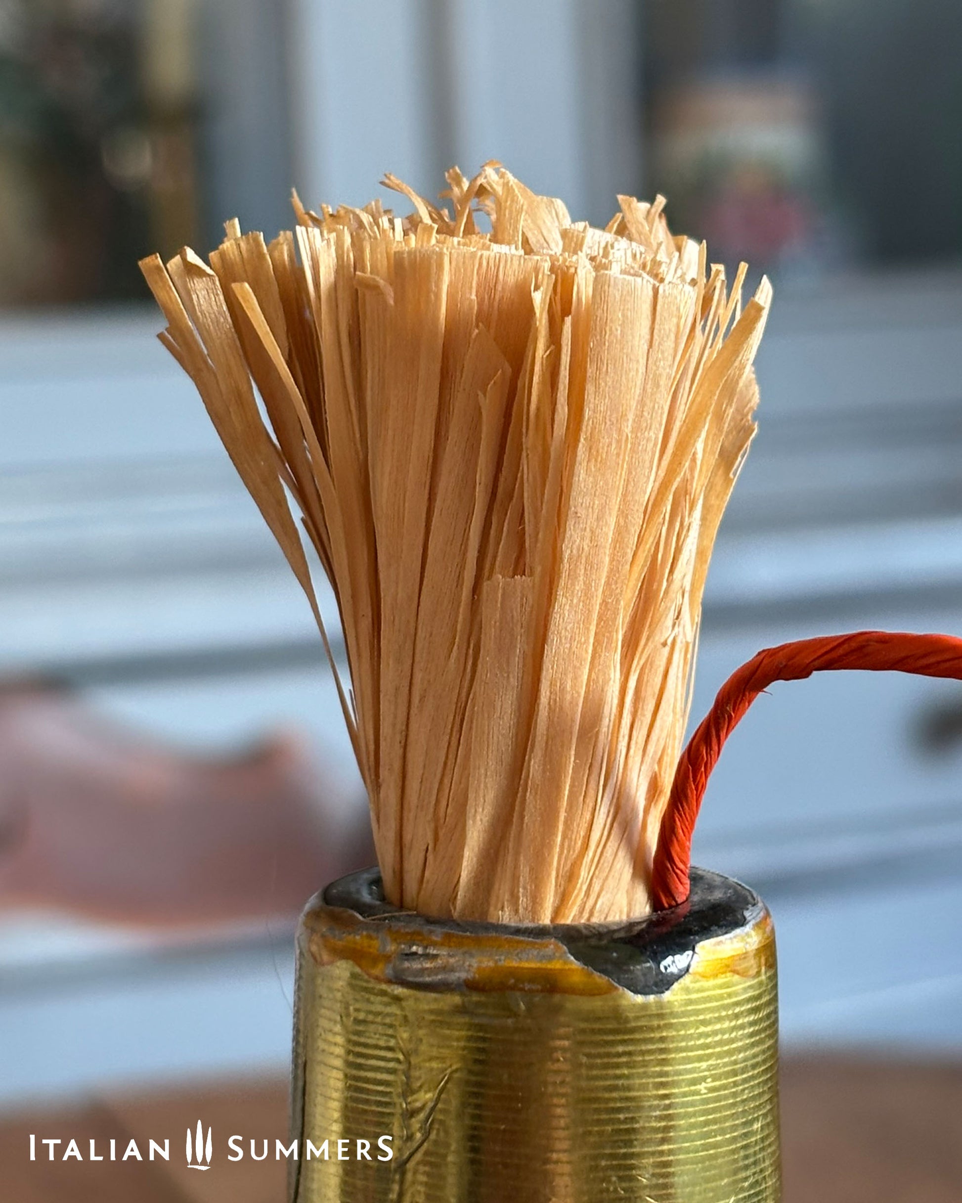 Wooden skewers in a metal can with a blurred background