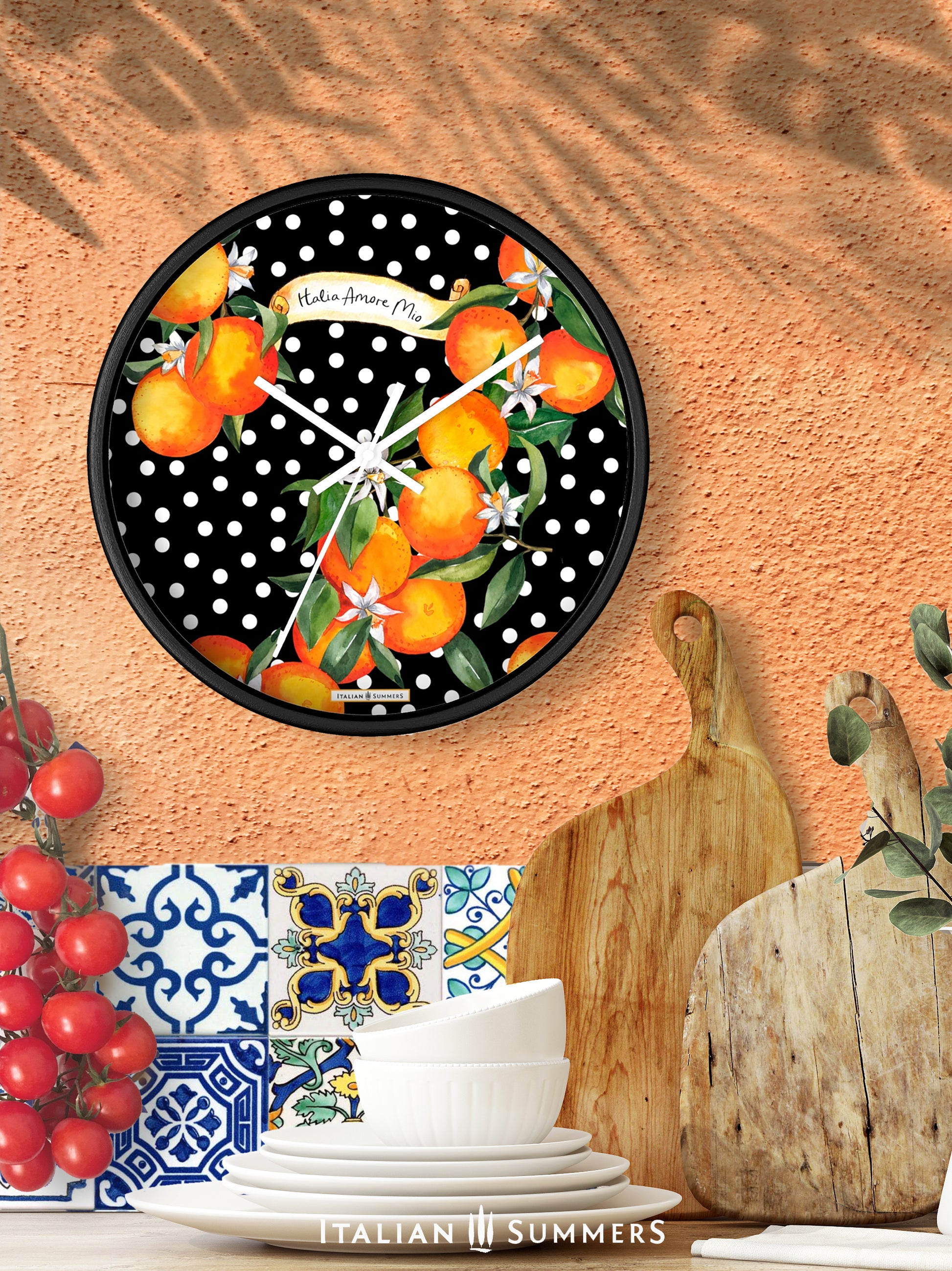 Wall clock SICILIAN GARDEN bursts with color, from the happy white polka dots to the lively orange blossoms. The timeless phrase 'Italia Amore Mio' adds a meaningful touch of love. Designed and sold by Italian Summers