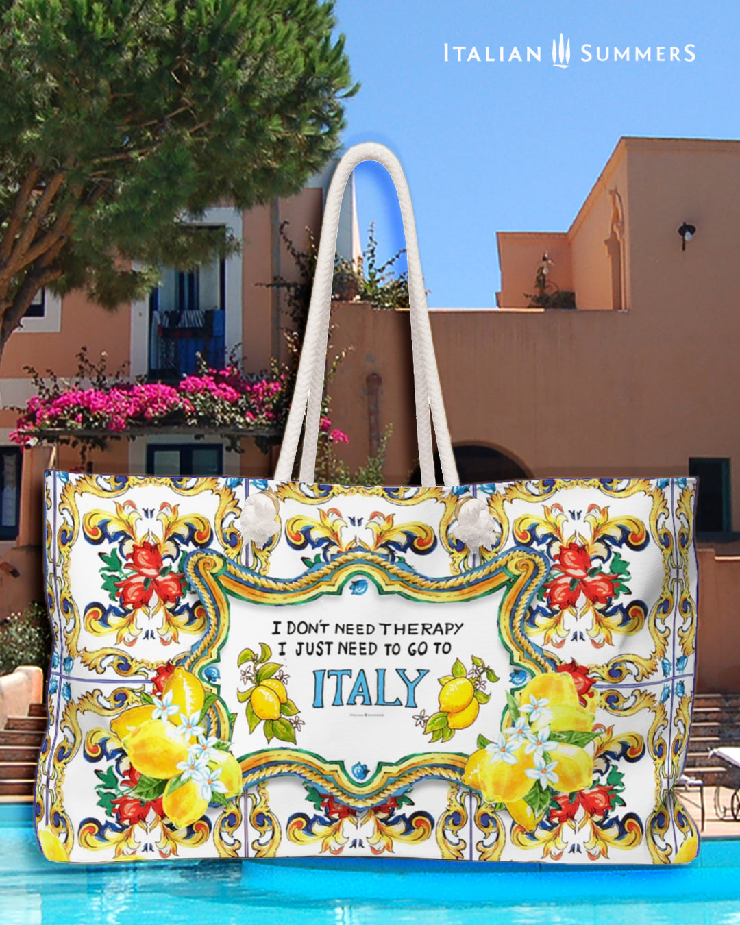 Italy, Sicily inspired beach bag with the quote I don't need therapy, I just need to go to Italy. Next to the word Italy are on both sides Sorrento lemons. The quote is surrounded by Sicilian baroque convolutes and big lemons. On the background there are Sicilian tiles. The bag is printed on two sides and has soft rope handles