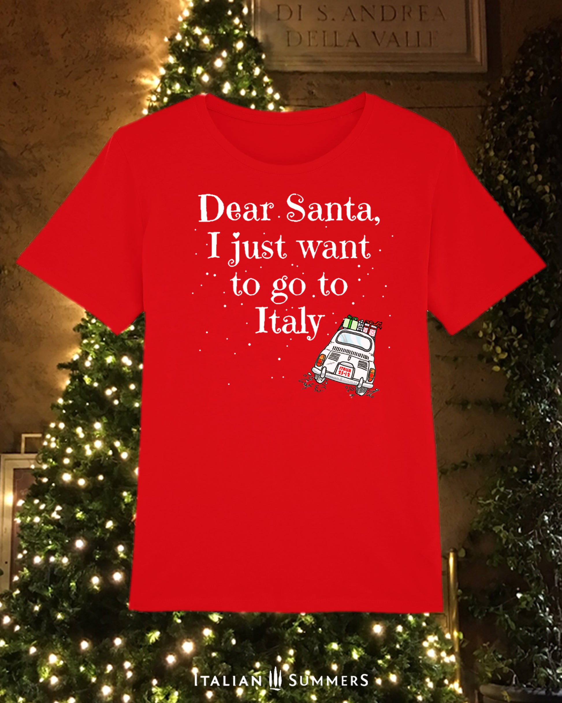 Christmas t-shirt Dear Santa I just want to go to Italy by Italian Summers. Our bestseller Italy Chirstmas shirt with the quote and a sketch of a Fiat 500 with presents on the roof driving on its way to Italy while snow is falling!