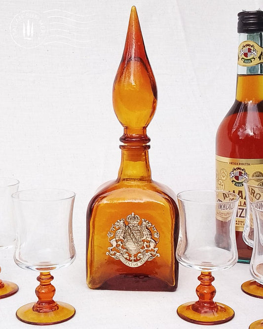 Vintage 1960-70s Empoli amber glass decanter and four baroque glasses set, genie bottle.