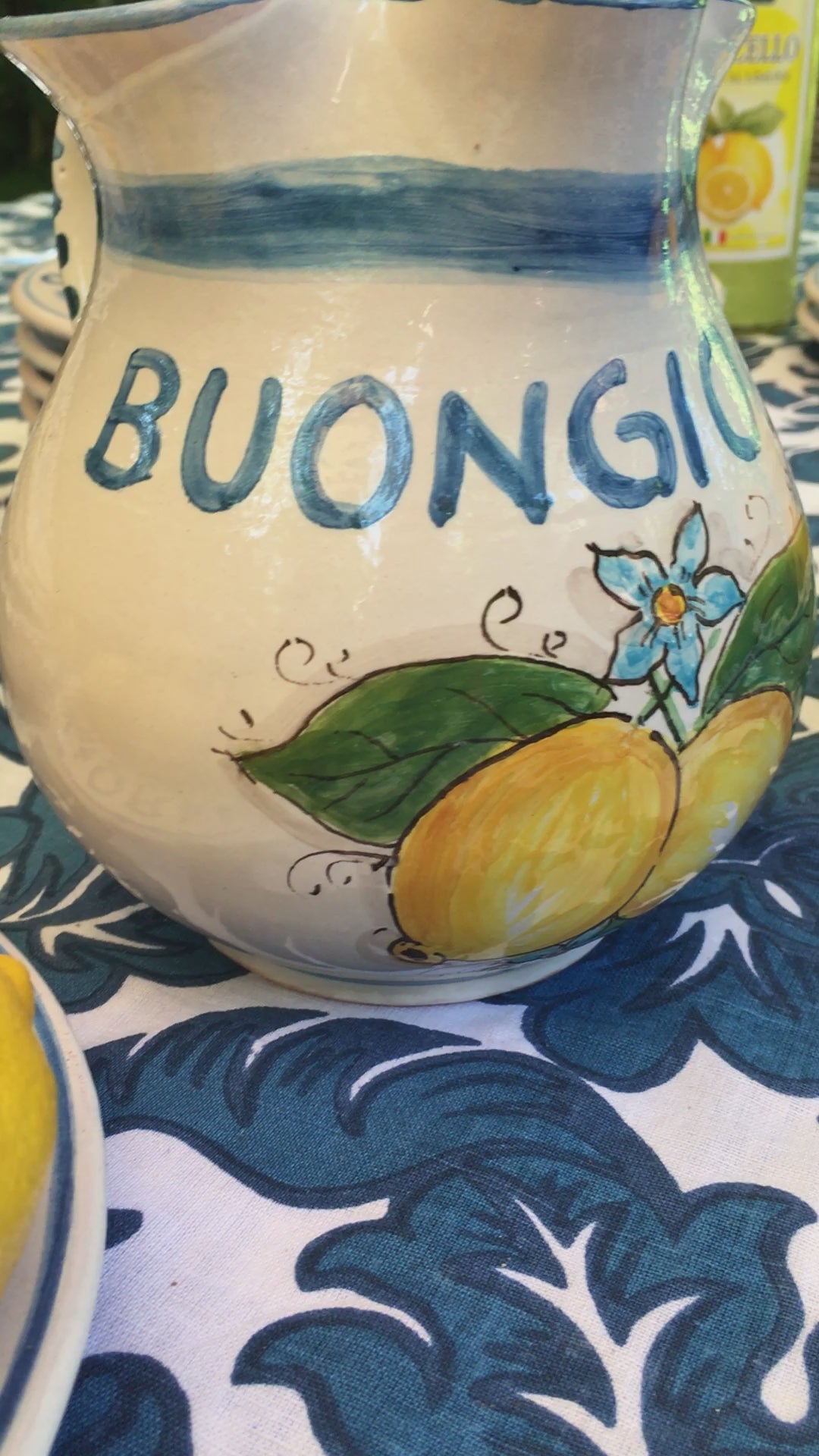 Bright and happy Italian ceramic brocca with handpainted Amalfi Coast lemons and the text Buongiorno in the color azur blue. By Italian Summers