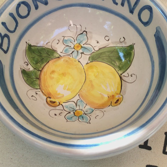 Italian ceramic lemon bowls with the text Buongiorno. The Amalfi coast lemons are hand painted on the inside of the bowl and the word Buongiorno is on the inside on the top of the rim. By Italian Summers