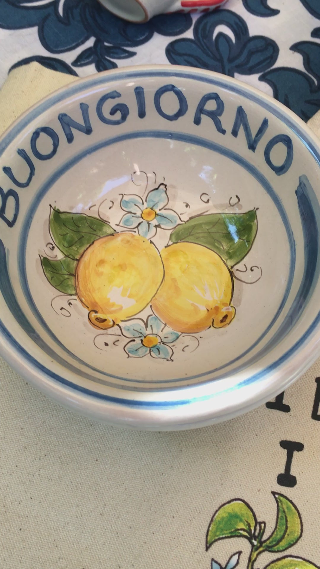 Italian ceramic lemon bowls with the text Buongiorno. The Amalfi coast lemons are hand painted on the inside of the bowl and the word Buongiorno is on the inside on the top of the rim. By Italian Summers