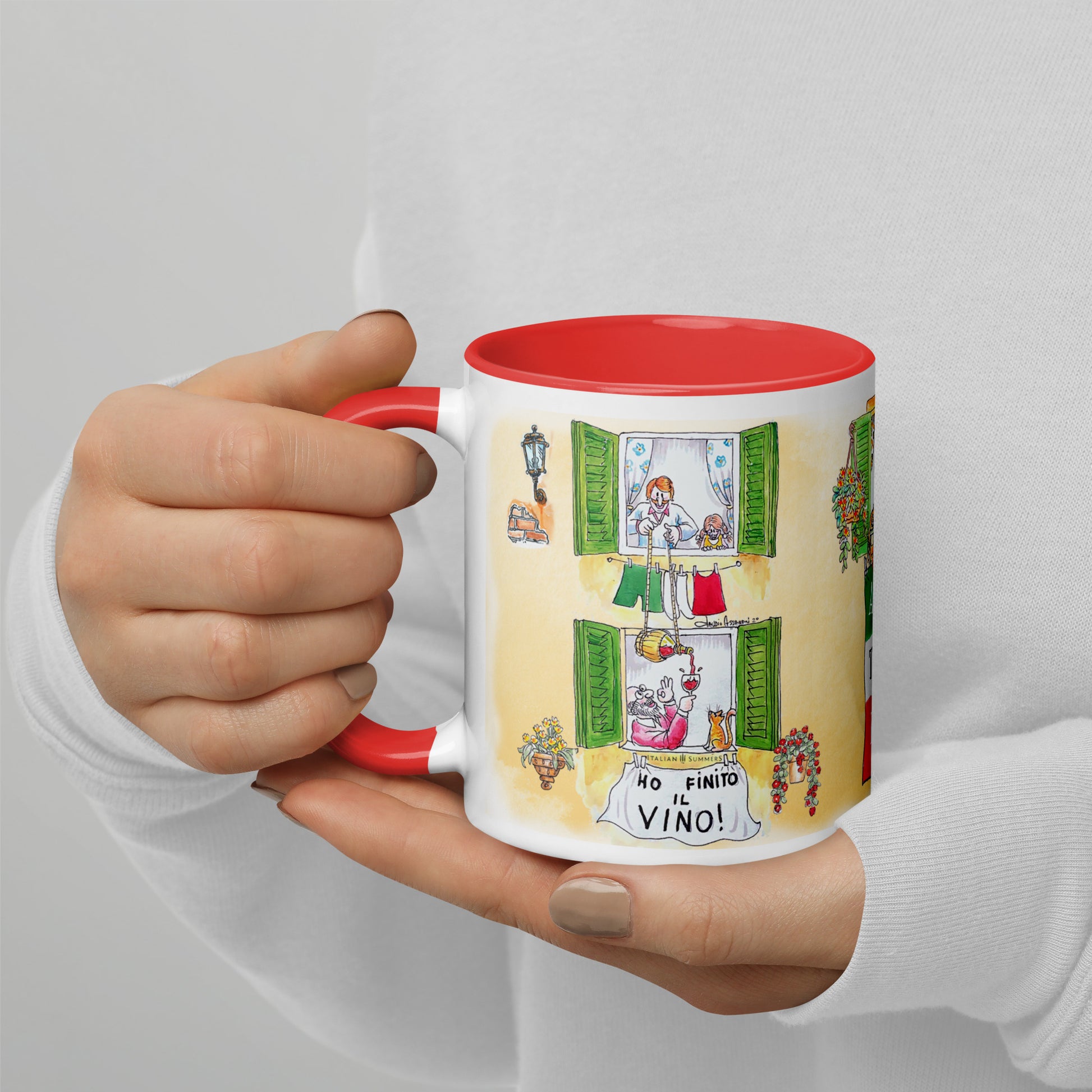 Italy inspired mug with sketches of Italian lifestyle. A sketch of two Italian windows where the downstairs neighbour is without vino. He holds the glas up, out of the window and the upstairs neughbour lowers a flask of good Chinti wine to share some good cheer. Italian solidarity at play! :-) The mug has a yellow or red inside/handle. Made by Italian Summers