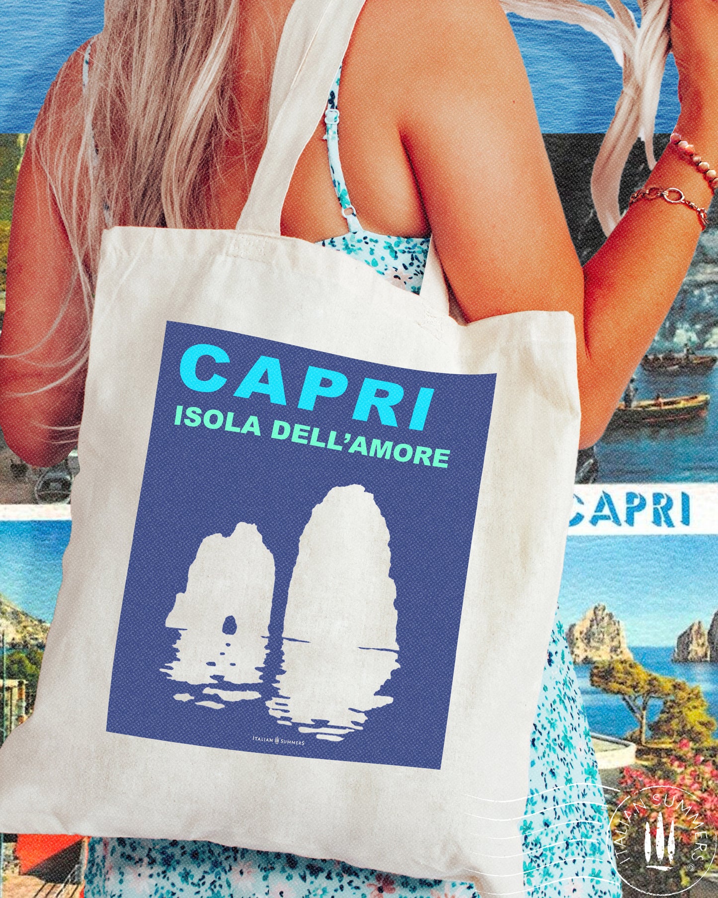 Italy inspired tote bag that represents a navy blue field containing a turqoise Capri text and under that the text Isola del Amore means Isand of love. Under the text there is the silhouet of the Faraglioni in white. Designed by Italian Summers